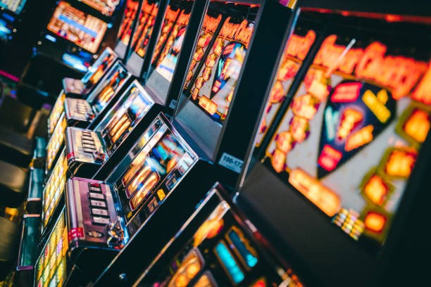 Mobile-first interface Mobile phone displaying Three Card Poker hand on ozototo app